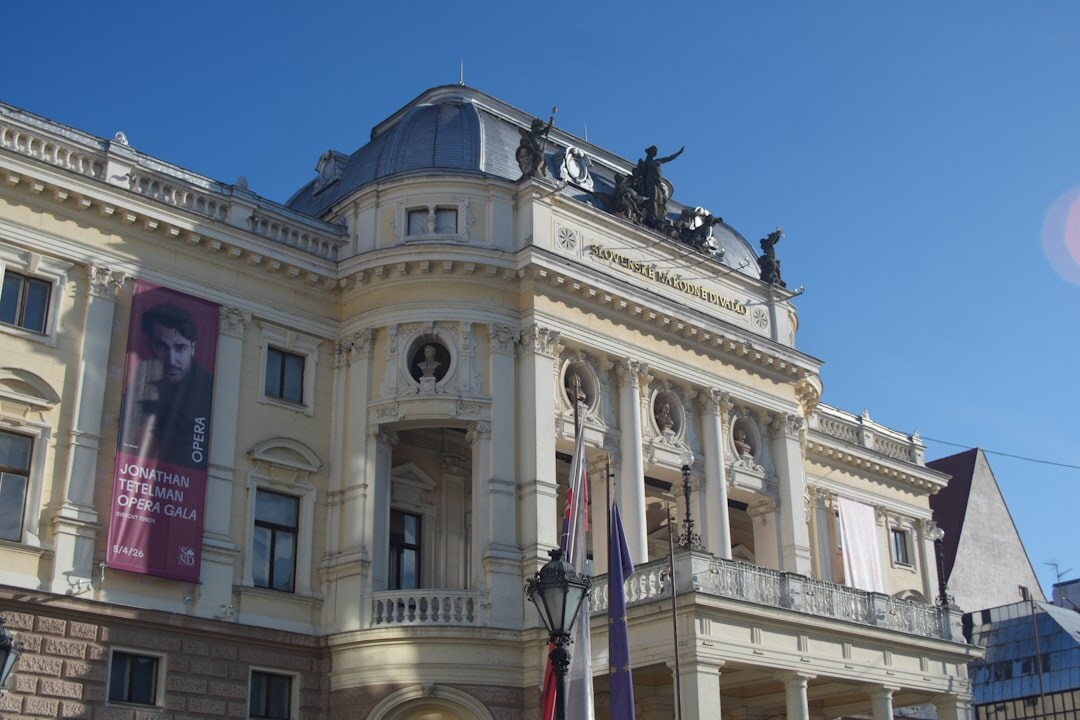 Seniors watching a theatre performance in a historic Slovak theatre