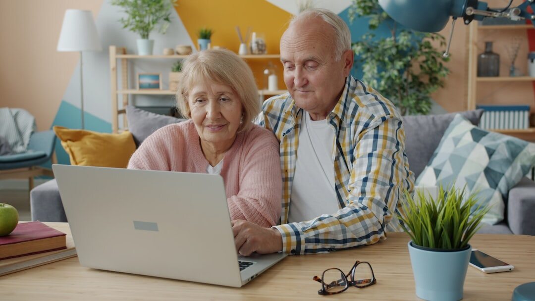 senior couple reviewing budget