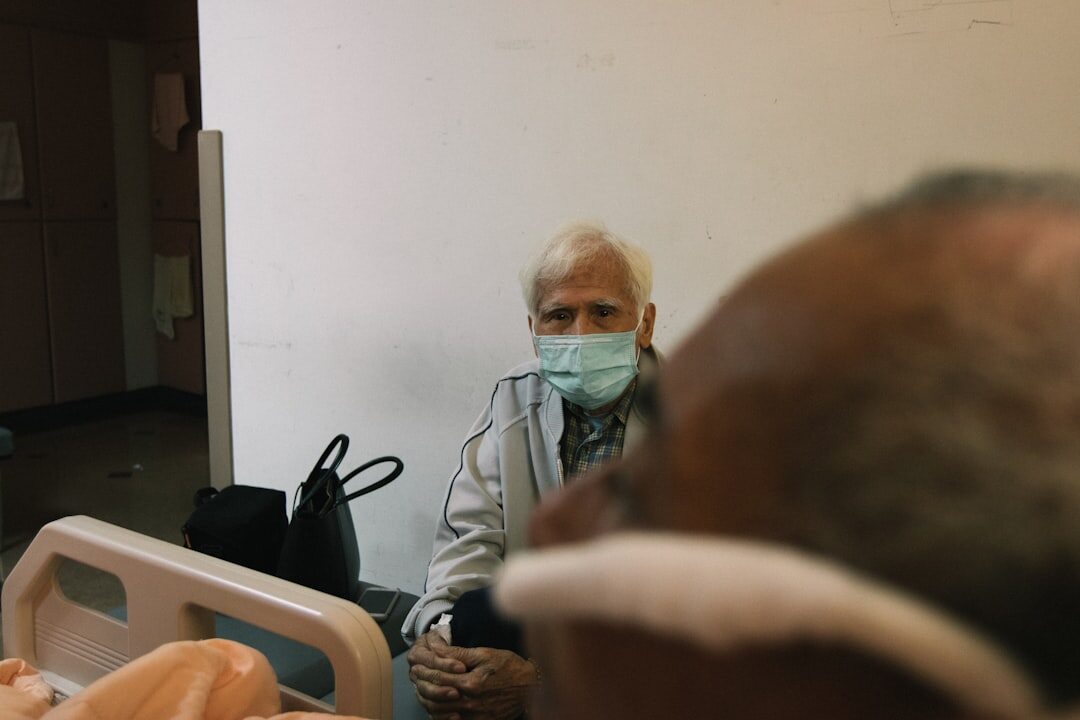 elderly patient with doctor