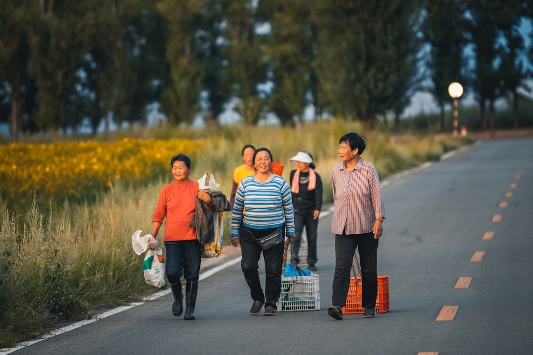 Group of seniors boarding a bus for a countryside day trip