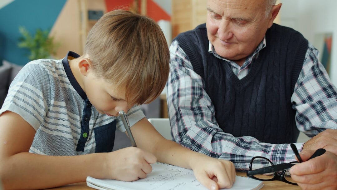 Volunteer assisting a senior citizen with paperwork at a help desk
