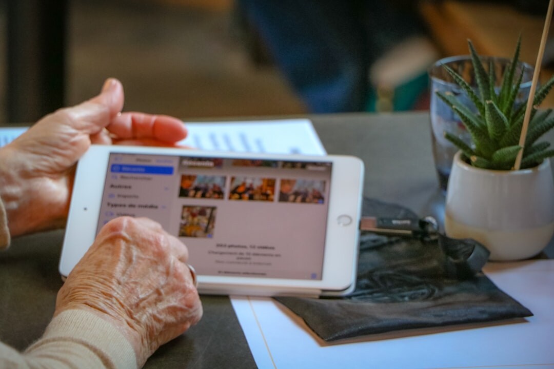 elderly people using tablet