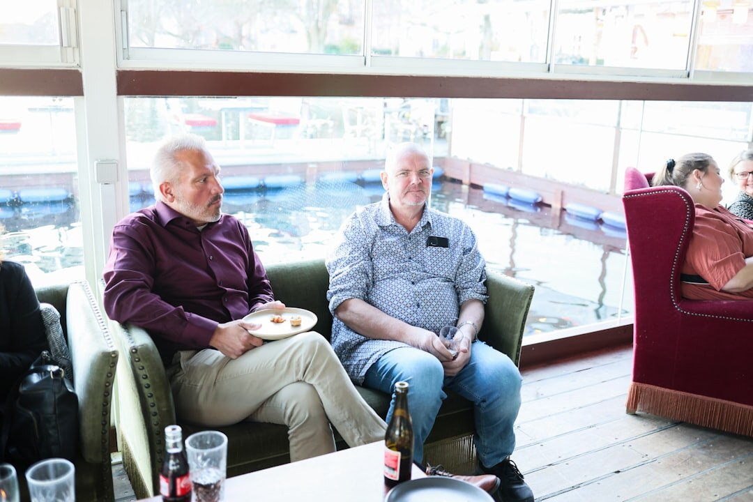 Seniors chatting over coffee at a social gathering