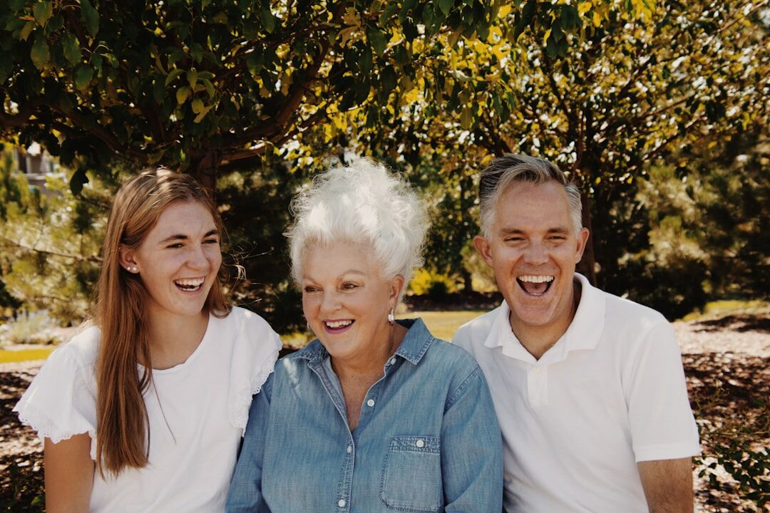 Group of active Slovak senior citizens smiling together outdoors in a park